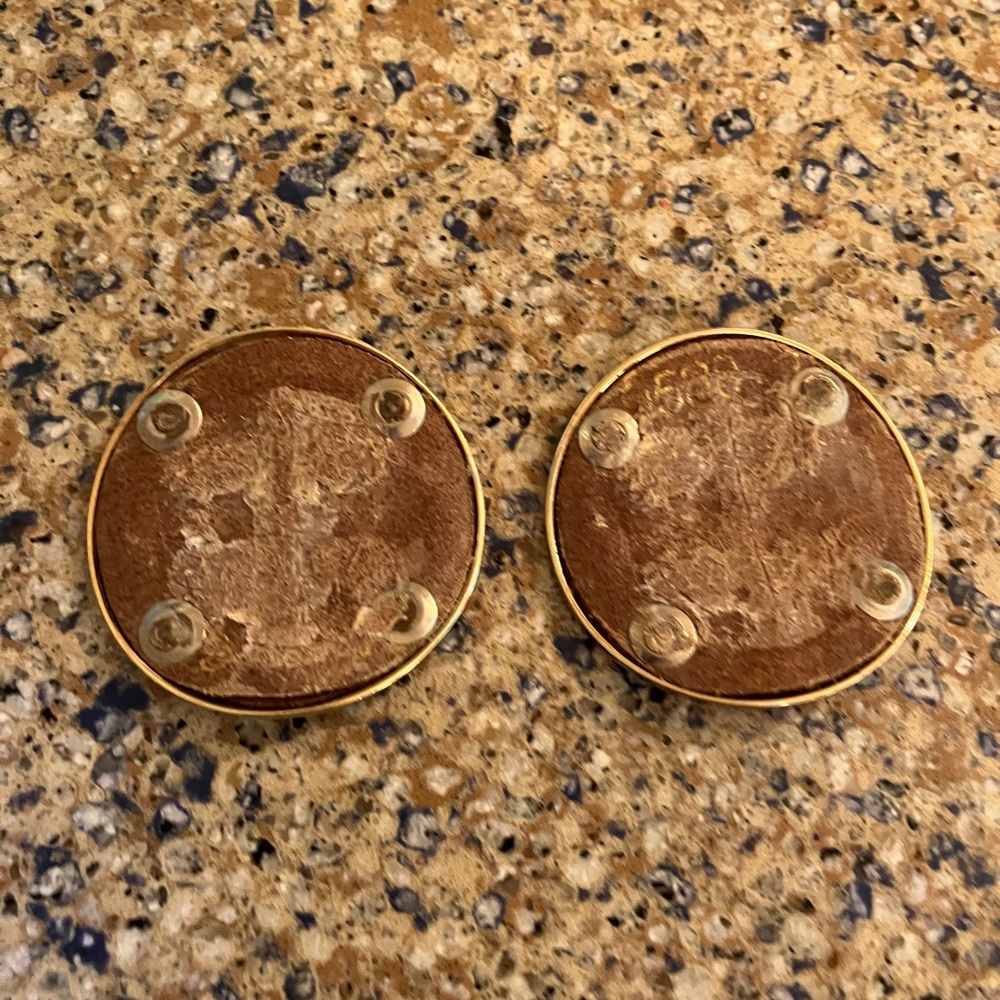 Two Tory Burch gold medal insignia pieces in perfect condition